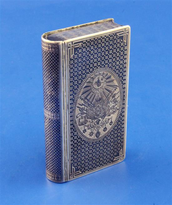 A Turkish WWII period silver and niello book form snuff box, engraved sunburst, military trophies, Iron Crescent and other medals